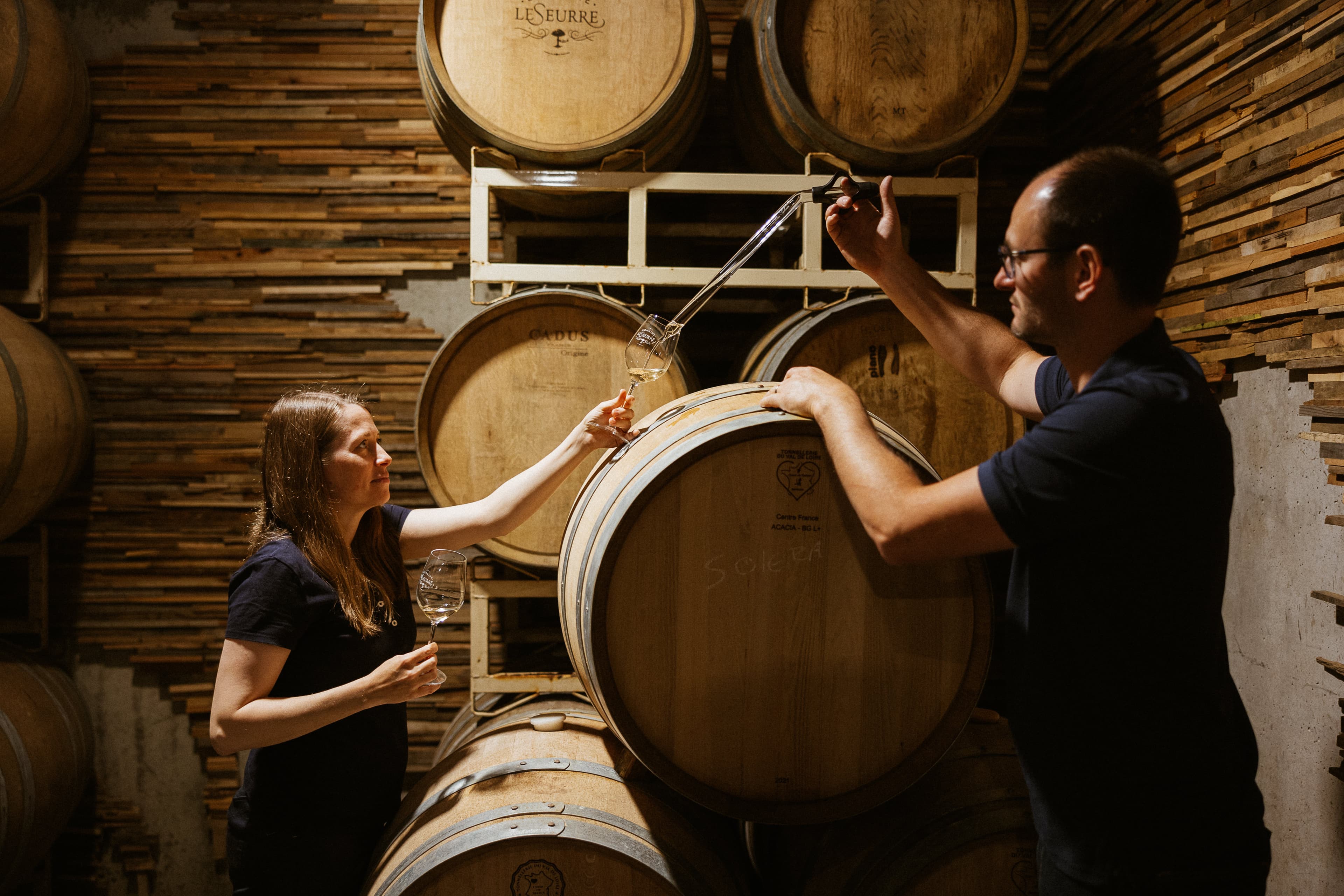 Céline and Sébastien LeSeurre in the cellar.